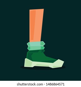 foot with a green shoe