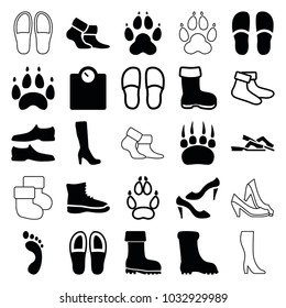 Foot icons. set of 25 editable filled and outline foot icons such as boot, woman boot, slippers, man shoe, shoe, floor scale, animal paw, socks, foot print, paw
