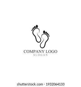 Logotipo de impresión a pie y vector de símbolo