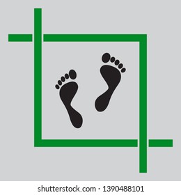 Foot prints sign. Black icon inside green crop tool at light gray background