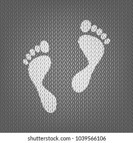 Foot prints sign. Vector. White knitted icon on gray knitted background. Isolated.