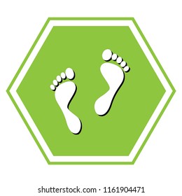 Foot prints sign. Vector. White icon with black shadow at yellow green honeycomb on white background.