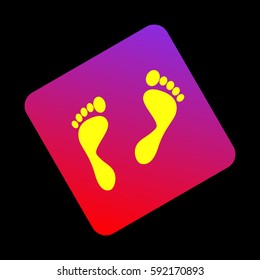 Foot prints sign. Vector. Yellow icon at violet-red gradient square with rounded corners rotated for dynamics on black background.