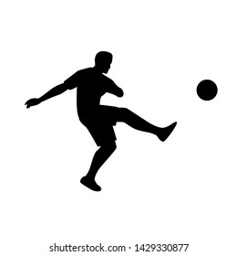 footbal player shooting a ball silhouette illustration