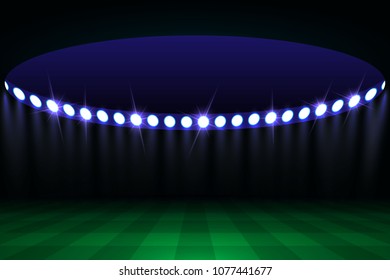 Football arena field with bright stadium lights