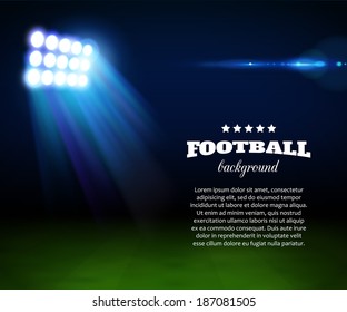 Football background with green field, spotlight and place for text.