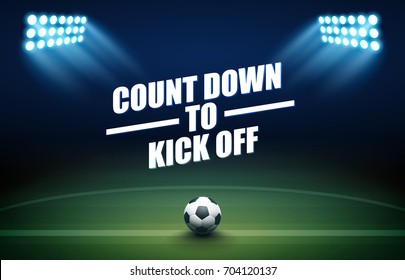 Football Background With Soccer Ball, Green Field, Spotlights, And Count Down To Kick Off Text.