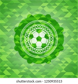 football ball icon inside green mosaic emblem