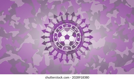 football ball icon inside pink camouflaged emblem. 
