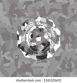 football ball icon on grey camo pattern