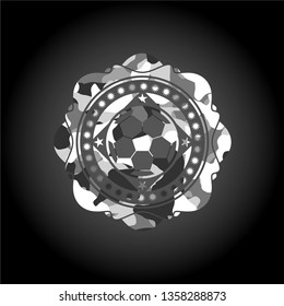 football ball icon on grey camo texture