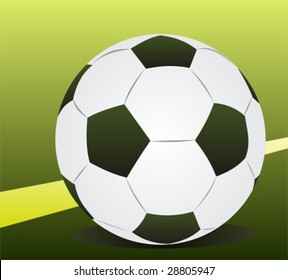 Football ball isolated on a green background.