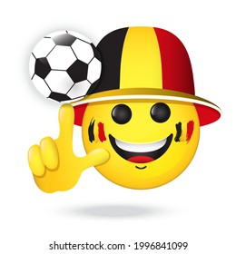 Football fan emoji. Vector emoticon in Belgium flag colors hat is spinning ball on the finger, playing with soccer ball, for internet chats, sports bars. Isolated icon for mobile apps, social media