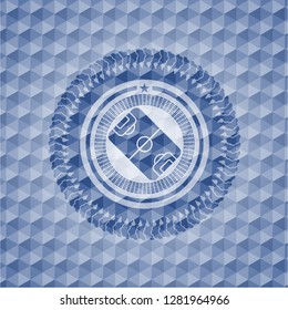 football field icon inside blue polygonal emblem.