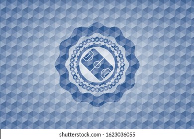 football field icon inside blue emblem with geometric pattern.