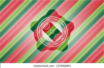 football field icon inside christmas style badge..