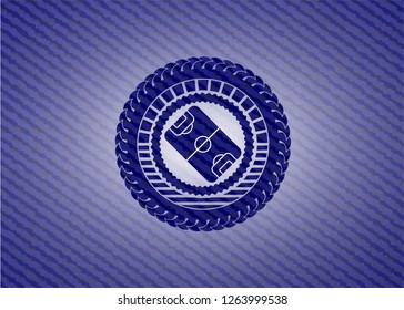 football field icon inside denim background