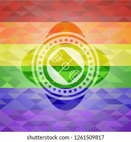 football field icon inside emblem on mosaic background with the colors of the LGBT flag