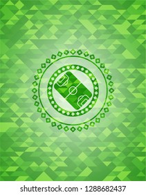 football field icon inside green mosaic emblem