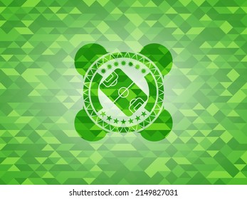 football field icon inside green mosaic emblem. 
