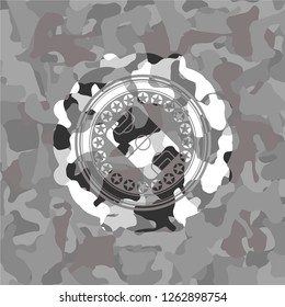 football field icon inside grey camouflage texture