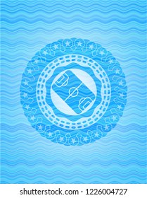 football field icon inside light blue water badge.