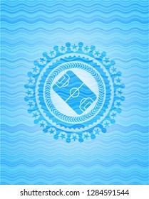 football field icon inside light blue water wave badge.