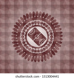 football field icon inside red seamless emblem or badge with abstract geometric pattern background.