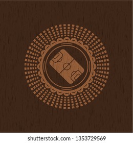 football field icon inside retro style wooden emblem