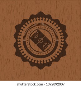 football field icon inside retro style wood emblem