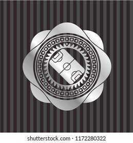 football field icon inside silver shiny badge