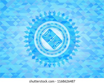 football field icon inside sky blue emblem with mosaic background