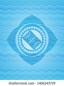 football field icon inside sky blue water style emblem.