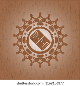 football field icon inside vintage wooden emblem