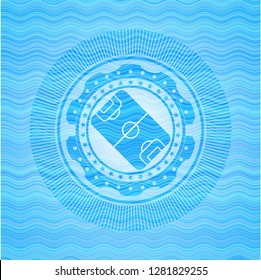 football field icon inside water concept badge background.