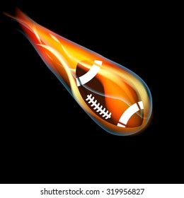 Football on fire on black background