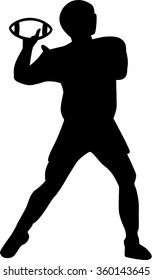 Football Player throws ball