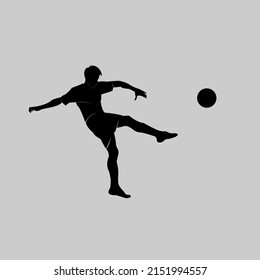 Football, soccer player kicking the ball, side view. Vector silhouette isolated on a white background
