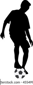football (soccer) player silhouette with ball isolated