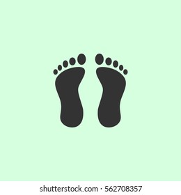 Footprint icon flat. Grey vector symbol on green background