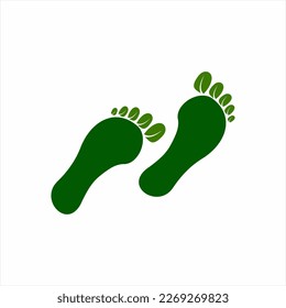 Footprint logo design with an environmentally friendly concept. Footprints with leaves.