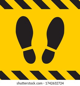Footprint social distancing sign yellow and black color. Keep zone and set position. Social distancing concept. Protection from Covid-19 or corona virus. Copy space for text. Vector illustration