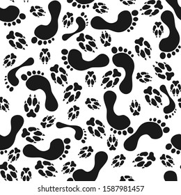 Footprints and animals dog or cat paws print on white seamless pattern. Vector illustration.