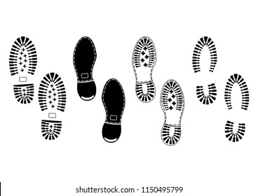 Footprints. Black silhouettes of soles of male shoes on a white background.Flat vector.