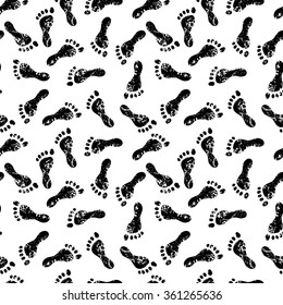 Footprints black and white seamless pattern, vector
