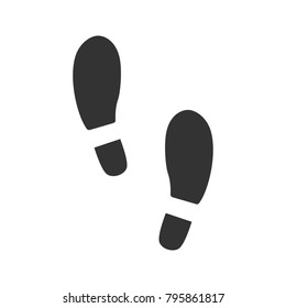 Footprints glyph icon. Footsteps. Evidence. Silhouette symbol. Negative space. Vector isolated illustration