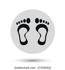 Footprints icon, black vector symbol with shadow