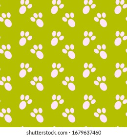 Footprints rabbit vector seamless pattern on green background Fun childish animal design element for decoration, wallpaper, print, paper, wrapping, web.