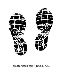 Footprints and shoeprints icon in black and white showing bare feet and the imprint of the soles with patterns of male and female footwear. Shoes boots imprint