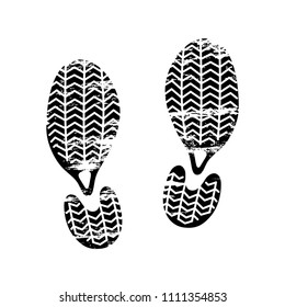 Footprints and shoeprints icon in black and white showing bare feet and the imprint of the soles with patterns of male and female footwear. Shoes boots imprint